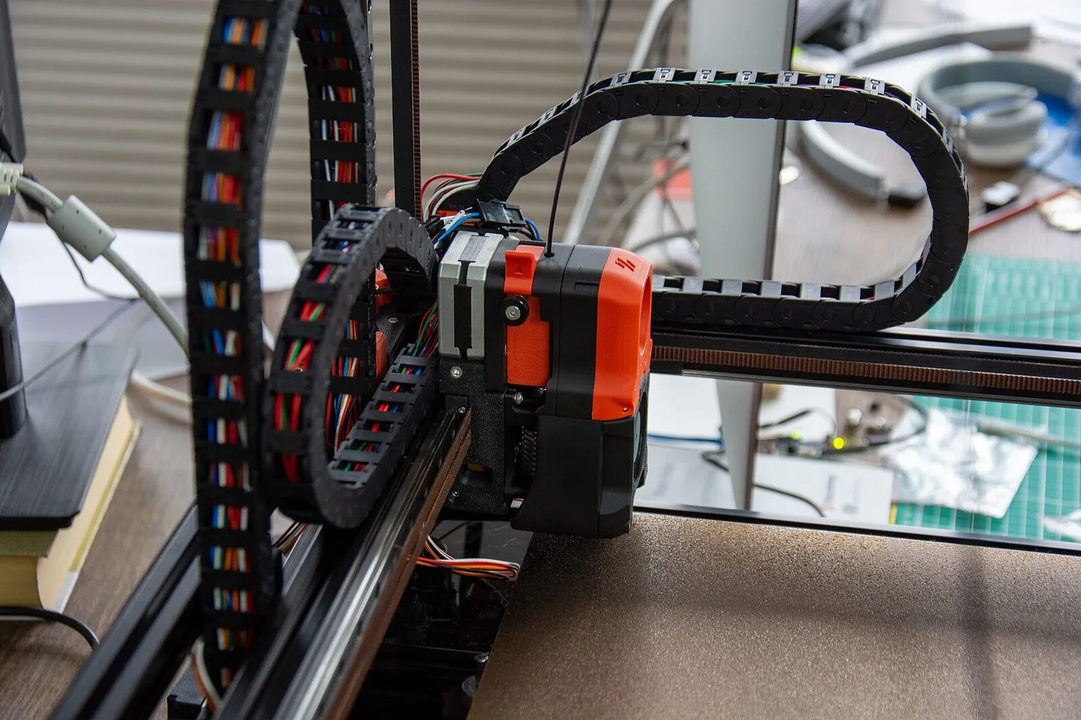A Voron toolhead and its cable chain on the gantry, seen from above the frame